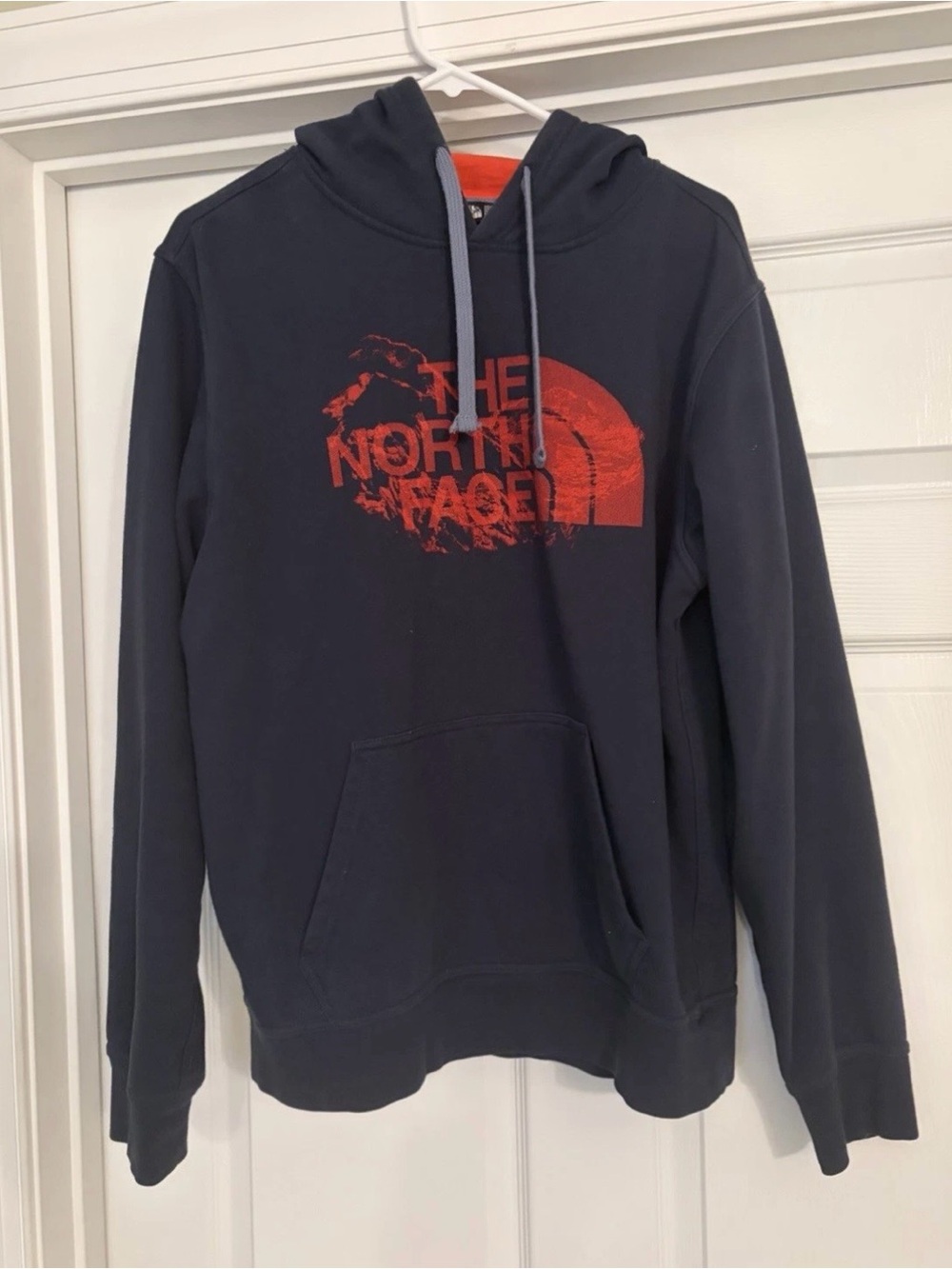 The North Face Navy Pullover Hoodie with Red Logo